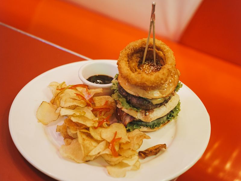 Burger and chips served in a retro diner